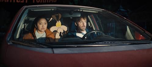 Paige, Wile E. Coyote, and Kevin Avery riding in a car at night